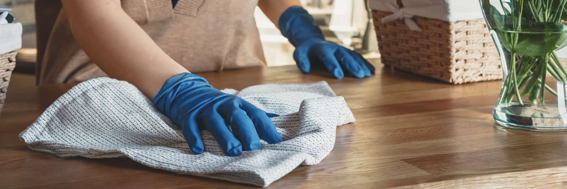 Woman cleaning desk